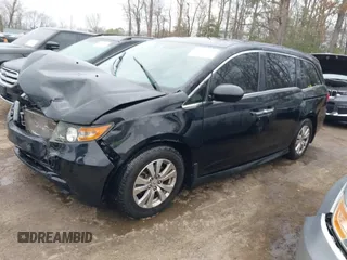 2016 Honda Odyssey EX-L with VIN 5FNRL5H65GB093937, listed as a IAAI auction lot 41691669 with 264,960 mi miles and . Bid and sale history available at DreamBid. Image 16.