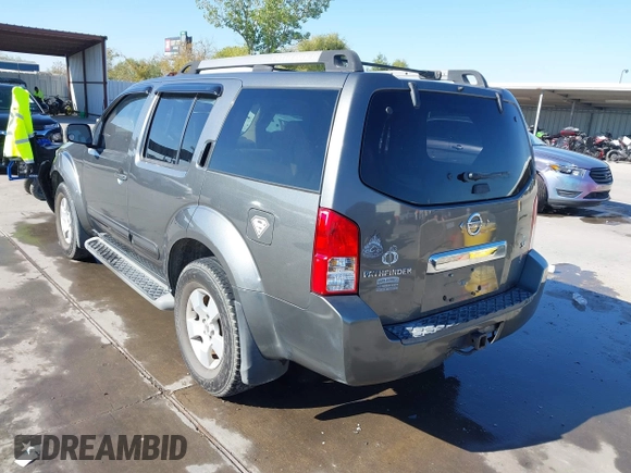 2005 Nissan Pathfinder SE with VIN 5N1AR18U45C751529, listed as a IAAI auction lot 41009894 with 167,023 mi miles. Bid and sale history available at carsss.com. Image 3.