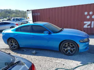 2015 Dodge Charger SXT with VIN 2C3CDXHG1FH866598, listed as a IAAI auction lot 41944761 with 201,163 mi miles and . Bid and sale history available at DreamBid. Image 13.