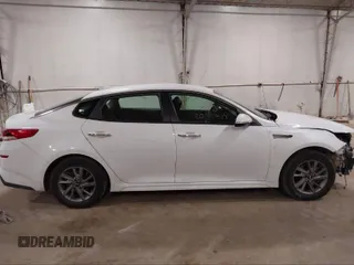 2020 Kia Optima LX with VIN 5XXGT4L33LG382675, listed as a IAAI auction lot 41574386 with 122,732 mi miles and . Bid and sale history available at DreamBid. Image 13.