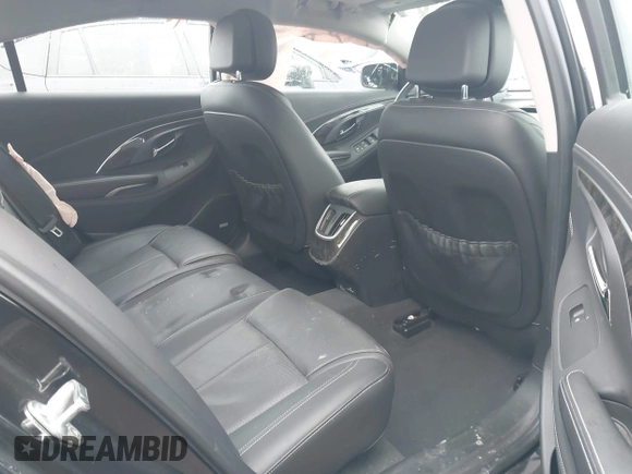 2014 Buick LaCrosse Premium II with VIN 1G4GF5G39EF305104, listed as a IAAI auction lot 41715121 with 81,341 mi miles and . Bid and sale history available at DreamBid. Image 8.