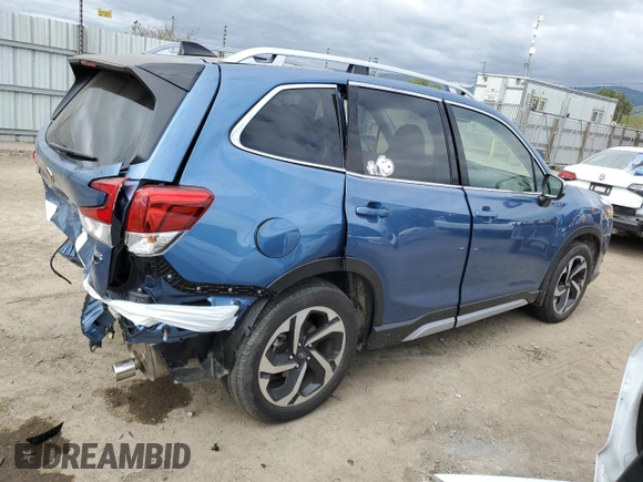 2024 Subaru Forester Touring with VIN JF2SKAMC2RH442467, listed as a Copart auction lot 53766735 with 7,206 mi miles and Salvage title. Bid and sale history available at DreamBid. Image 3.