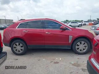 2015 Cadillac SRX Luxury Collection with VIN 3GYFNBE36FS560305, listed as a IAAI auction lot 42142934 with 160,543 mi miles and . Bid and sale history available at carsss.com. Image 13.