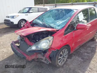 2013 Honda Fit Sport z VIN JHMGE8H51DC080183, wystawiony jako IAAI lot #42178982 z przebiegiem 174 133 mil mil oraz . Historia ofert i sprzedaży dostępna na DreamBid. Obrazek 6.