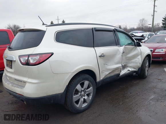 2014 Chevrolet Traverse LTZ z VIN 1GNKRJKDXEJ263349, wystawiony jako IAAI lot #41180521 z przebiegiem 141 564 mil mil oraz . Historia ofert i sprzedaży dostępna na DreamBid. Obrazek 4.