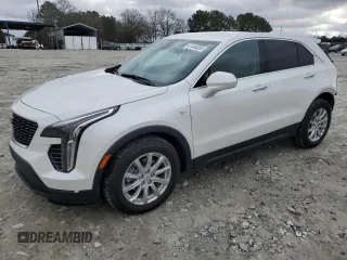 2022 Cadillac XT4 FWD Luxury with VIN 1GYAZAR45NF161724, listed as a Copart auction lot 41448055 with 26,467 mi miles and Salvage Title. Bid and sale history available at carsss.com. Image 1.