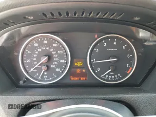 2013 BMW X5 xDrive35i z VIN 5UXZV4C5XD0B03182, wystawiony jako Copart lot #54906305 z przebiegiem 166 493 mil mil oraz Szkody całkowita. Historia ofert i sprzedaży dostępna na DreamBid. Obrazek 9.