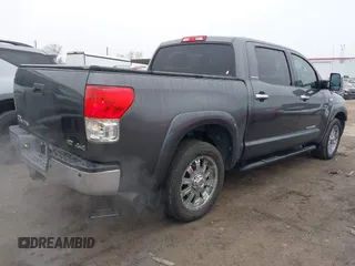 2012 Toyota Tundra 4WD Truck LTD with VIN 5TFHW5F17CX211075, listed as a IAAI auction lot 41510976 with 204,930 mi miles. Bid and sale history available at carsss.com. Image 4.