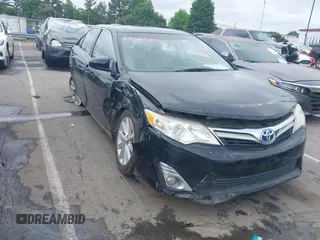 2012 Toyota Camry XLE z VIN 4T1BD1FK3CU053425, wystawiony jako IAAI lot #42319537 z przebiegiem 152 176 mil mil oraz . Historia ofert i sprzedaży dostępna na DreamBid. Obrazek 1.