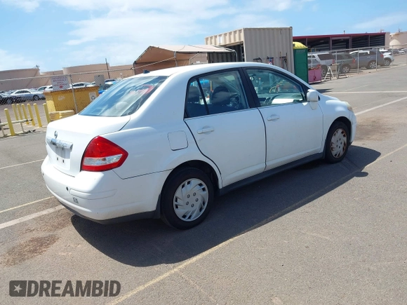2009 Nissan Versa 1.8 S with VIN 3N1BC11E99L371998, listed as a IAAI auction lot 41723771 with 130,172 mi miles. Bid and sale history available at carsss.com. Image 4.