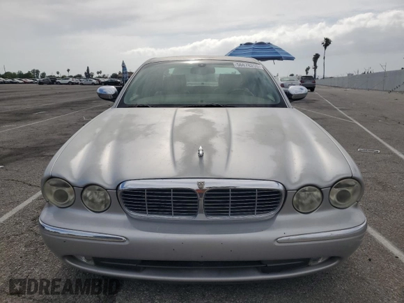 2004 Jaguar XJ Vanden Plas with VIN SAJWA74C04SG25291, listed as a Copart auction lot 56678255 with 176,597 mi miles and Clean Title. Bid and sale history available at DreamBid. Image 5.
