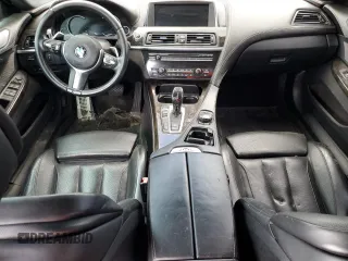 2015 BMW 6 Series 650i z VIN WBA6B2C5XFD130082, wystawiony jako Copart lot #58449885 z przebiegiem Nie podano mil oraz Czysty tytuł • Clean title. Historia ofert i sprzedaży dostępna na DreamBid. Obrazek 8.