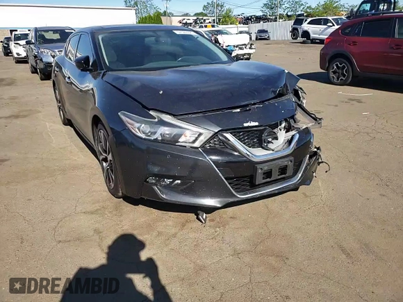 2017 Nissan Maxima SL with VIN 1N4AA6AP9HC434613, listed as a Copart auction lot 57560025 with 99,433 mi miles and Salvage title. Bid and sale history available at DreamBid. Image 13.