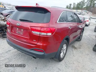 2018 Kia Sorento LX z VIN 5XYPG4A39JG400774, wystawiony jako IAAI lot #41711055 z przebiegiem 56 046 mil mil oraz . Historia ofert i sprzedaży dostępna na DreamBid. Obrazek 4.
