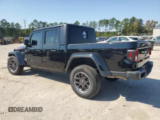2023 Jeep Gladiator High Altitude with VIN 1C6HJTFG6PL523237, listed as a Copart auction lot 75999734 with 53,363 mi miles and Salvage title. Bid and sale history available at DreamBid. Image 2.