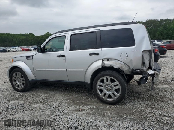 2011 Dodge Nitro Heat with VIN 1D4PU4GK4BW546420, listed as a Copart auction lot 54851415 with 165,789 mi miles and Salvage title. Bid and sale history available at DreamBid. Image 2.