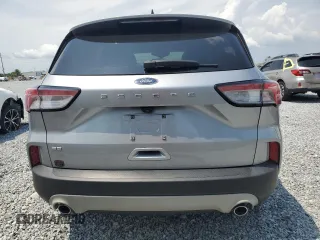 2021 Ford Escape SE z VIN 1FMCU0G64MUA91313, wystawiony jako Copart lot #56318425 z przebiegiem Nie podano mil oraz Szkoda całkowita • Salvage title. Historia ofert i sprzedaży dostępna na DreamBid. Obrazek 6.