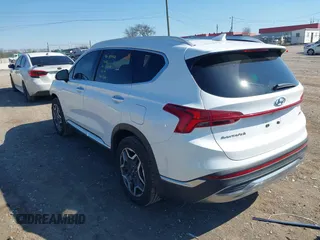 2022 Hyundai Santa Fe Limited with VIN 5NMS44ALXNH411409, listed as a IAAI auction lot 41889017 with 50,676 mi miles. Bid and sale history available at carsss.com. Image 3.