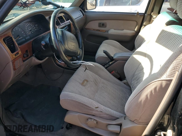 1997 Toyota 4Runner SR5 z VIN JT3HN86RXV0100711, wystawiony jako Copart lot #56483995 z przebiegiem 184 667 mil mil oraz Szkoda całkowita • Salvage title. Historia ofert i sprzedaży dostępna na DreamBid. Obrazek 7.