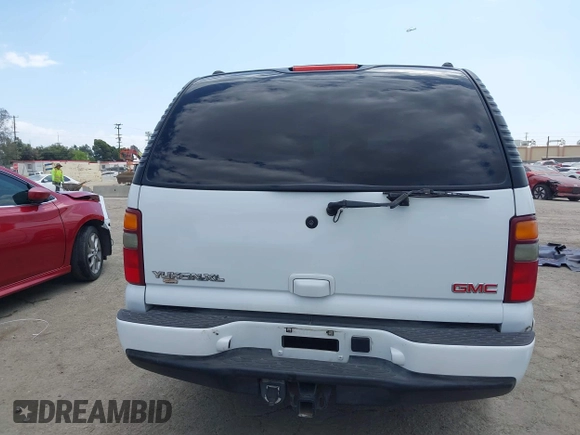 2003 GMC Yukon XL Denali with VIN 1GKFK66UX3J227538, listed as a IAAI auction lot 41915607 with 150,173 mi miles. Bid and sale history available at carsss.com. Image 16.