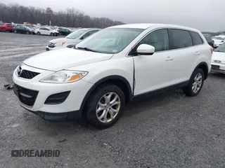 2011 Mazda CX-9 Sport with VIN JM3TB3BV9B0304410, listed as a IAAI auction lot 41511952 with 136,769 mi miles and . Bid and sale history available at DreamBid. Image 2.