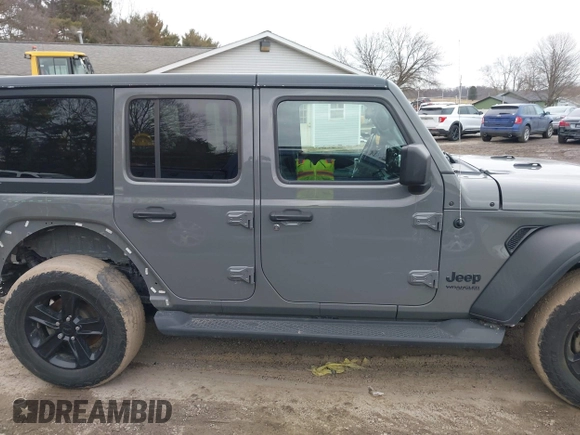 2021 Jeep Wrangler Unlimited Sport Altitude with VIN 1C4HJXDG1MW603784, listed as a IAAI auction lot 41509231 with 102,567 mi miles and . Bid and sale history available at DreamBid. Image 14.