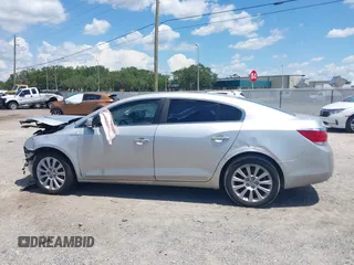 2013 Buick LaCrosse Leather with VIN 1G4GC5E36DF267888, listed as a IAAI auction lot 42584739 with 200,539 mi miles and . Bid and sale history available at DreamBid. Image 14.