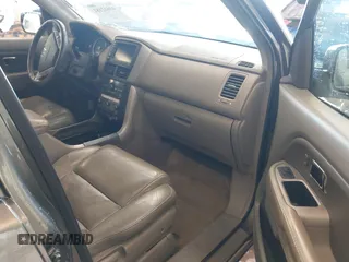 2006 Honda Pilot EX-L with VIN 5FNYF187X6B026463, listed as a IAAI auction lot 41612181 with 242,828 mi miles and . Bid and sale history available at DreamBid. Image 5.