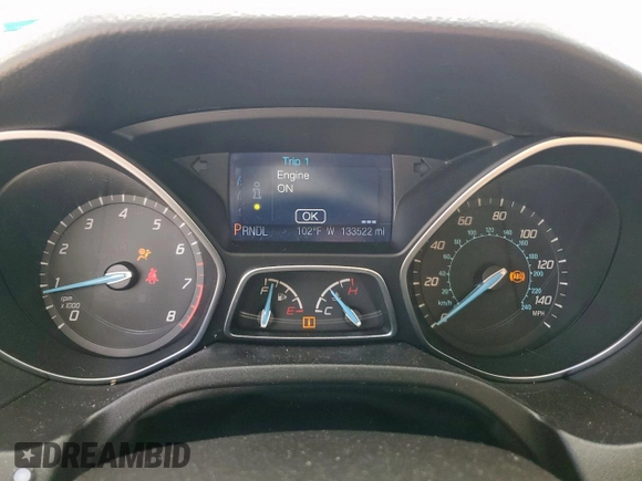 2013 Ford Focus SE with VIN 1FADP3F22DL263124, listed as a Copart auction lot 61583795 with 133,522 mi miles and Salvage title. Bid and sale history available at DreamBid. Image 9.
