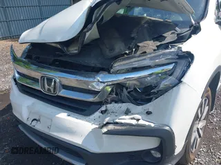 2021 Honda Pilot EX with VIN 5FNYF6H38MB072297, listed as a IAAI auction lot 42561276 with 119,172 mi miles and . Bid and sale history available at DreamBid. Image 6.