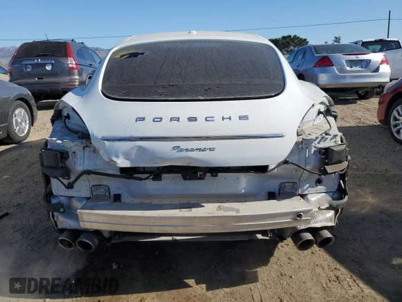 2013 Porsche Panamera z VIN WP0AA2A77DL010893, wystawiony jako Copart lot #42727885 z przebiegiem 143 353 mil mil oraz Szkoda całkowita • Salvage title. Historia ofert i sprzedaży dostępna na DreamBid. Obrazek 6.