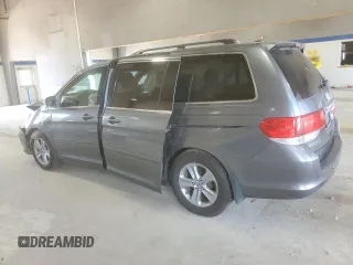2010 Honda Odyssey Touring with VIN 5FNRL3H91AB113770, listed as a Copart auction lot 61893115 with 155,776 mi miles and Salvage title. Bid and sale history available at DreamBid. Image 2.
