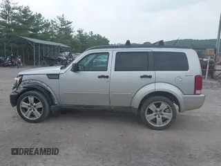 2011 Dodge Nitro Heat with VIN 1D4PU4GK1BW598734, listed as a IAAI auction lot 42498891 with 88,444 mi miles and . Bid and sale history available at DreamBid. Image 14.