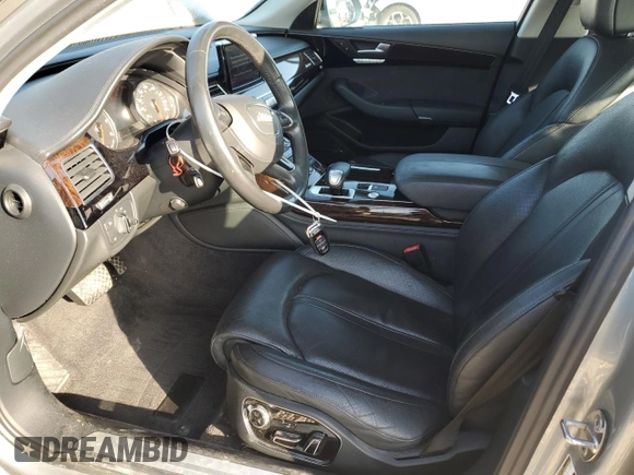 2012 Audi A8 with VIN WAURVAFD4CN023004, listed as a Copart auction lot 50181715 with 121,590 mi miles and Salvage title. Bid and sale history available at DreamBid. Image 7.
