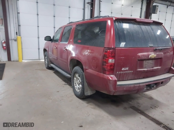 2013 Chevrolet Suburban LT with VIN 1GNSKJE76DR222890, listed as a IAAI auction lot 41698835 with 288,835 mi miles. Bid and sale history available at carsss.com. Image 3.