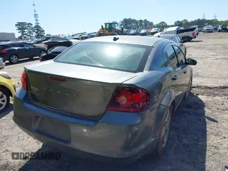 2013 Dodge Avenger SE with VIN 1C3CDZAB1DN658140, listed as a IAAI auction lot 41998306 with 215,548 mi miles. Bid and sale history available at carsss.com. Image 4.