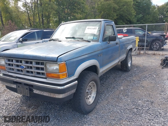 1990 Ford Ranger with VIN 1FTCR11T4LUB52586, listed as a IAAI auction lot 40423489 with 24,823 mi miles and . Bid and sale history available at DreamBid. Image 2.
