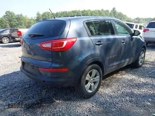 2012 Kia Sportage LX with VIN KNDPBCA28C7294317, listed as a IAAI auction lot 42759427 with 177,538 mi miles and . Bid and sale history available at DreamBid. Image 4.