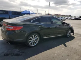 2015 Hyundai Azera Limited z VIN KMHFH4JG1FA453211, wystawiony jako Copart lot #51019915 z przebiegiem 122 712 mil mil oraz Szkoda całkowita • Salvage title. Historia ofert i sprzedaży dostępna na DreamBid. Obrazek 3.