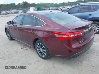 2014 Toyota Avalon Limited z VIN 4T1BK1EB5EU122996, wystawiony jako IAAI lot #42292676 z przebiegiem 157 690 mil mil oraz . Historia ofert i sprzedaży dostępna na DreamBid. Obrazek 3.