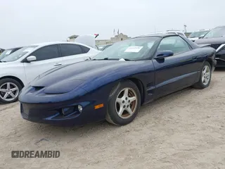 1999 Pontiac Firebird Firebird z VIN 2G2FS22K2X2232076, wystawiony jako IAAI lot #42147131 z przebiegiem 106 375 mil mil oraz . Historia ofert i sprzedaży dostępna na DreamBid. Obrazek 6.