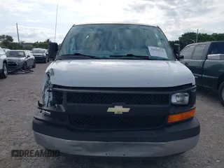 2014 Chevrolet Express Cargo Van with VIN 1GCSGAFX2E1121841, listed as a IAAI auction lot 42028712 with 164,768 mi miles. Bid and sale history available at carsss.com. Image 13.