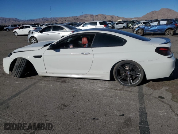 2015 BMW M6 z VIN WBSLX9C54FD160753, wystawiony jako Copart lot #83486484 z przebiegiem 80 275 mil mil oraz Szkody całkowita. Historia ofert i sprzedaży dostępna na DreamBid. Obrazek 2.