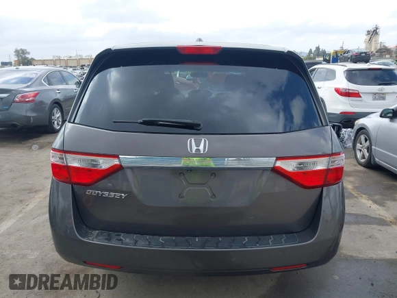 2011 Honda Odyssey EX-L with VIN 5FNRL5H61BB072124, listed as a IAAI auction lot 42115299 with 155,086 mi miles and . Bid and sale history available at DreamBid. Image 16.