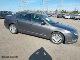 2011 Ford Fusion Hybrid with VIN 3FADP0L34BR290335, listed as a IAAI auction lot 42094674 with 171,391 mi miles. Bid and sale history available at carsss.com. Image 1.