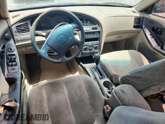 2001 Hyundai Elantra GLS z VIN KMHDN45D61U132398, wystawiony jako Copart lot #61164165 z przebiegiem 162 729 mil mil oraz Szkoda całkowita • Salvage title. Historia ofert i sprzedaży dostępna na DreamBid. Obrazek 8.