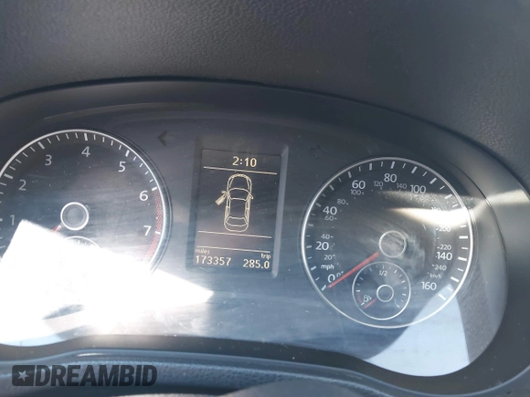 2012 Volkswagen Passat SE with VIN 1VWBH7A36CC027321, listed as a IAAI auction lot 41596709 with 173,357 mi miles and . Bid and sale history available at DreamBid. Image 7.