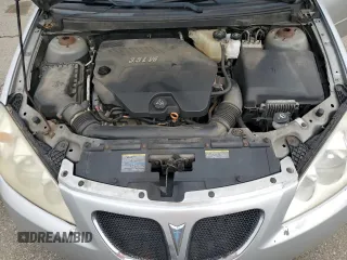 2009 Pontiac G6 1SA z VIN 1G2ZG57N894137408, wystawiony jako Copart lot #51671705 z przebiegiem 130 613 mil mil oraz Czysty tytuł • Clean title. Historia ofert i sprzedaży dostępna na DreamBid. Obrazek 11.