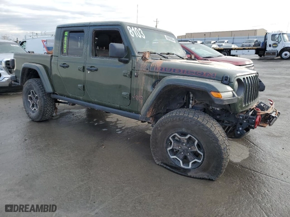 2022 Jeep Gladiator Rubicon with VIN 1C6JJTBMXNL173279, listed as a Copart auction lot 85455834 with 0 mi miles and Salvage Title. Bid and sale history available at carsss.com. Image 4.