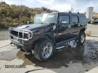 2006 Hummer H2 with VIN 5GRGN23U36H101486, listed as a Copart auction lot 74577884 with 146,203 mi miles and Salvage Title. Bid and sale history available at carsss.com. Image 1.